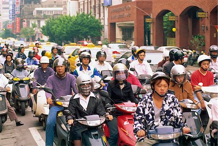 simsearch:855-02988628,k - Motorcyclist at rush hour, Taipei Stock Photo - Rights-Managed, Code: 855-02985712