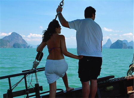 simsearch:855-02986677,k - Couples à bord de la jonque en tournée à la baie de Phang Nga, Thaïlande Photographie de stock - Rights-Managed, Code: 855-02986695