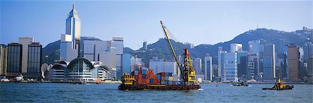 Chaland de charge de Victoria Harbour, Hong Kong Photographie de stock - Rights-Managed, Code: 855-02986922