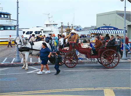 simsearch:855-02988065,k - Tourist carriages touring at Fisherman's Wharf, San Francisco Foto de stock - Direito Controlado, Número: 855-02988148