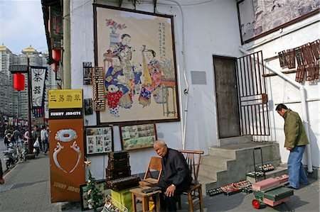 Vendor at Fongbin Road antique market, Shanghai Stock Photo - Rights-Managed, Code: 855-02988386