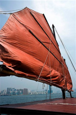 simsearch:855-03022608,k - Chinese junk 'Dukling' in Victoria Harbour with Tsimshatsui East skyline at the background,Hong Kong Foto de stock - Con derechos protegidos, Código: 855-03024091