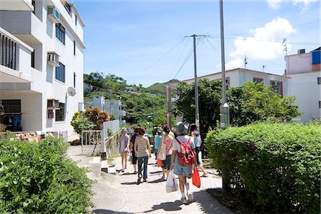 Visitors on Yung Shu Wan,Lamma Island,Hong Kong Fotografie stock - Rights-Managed, Codice: 855-03024116