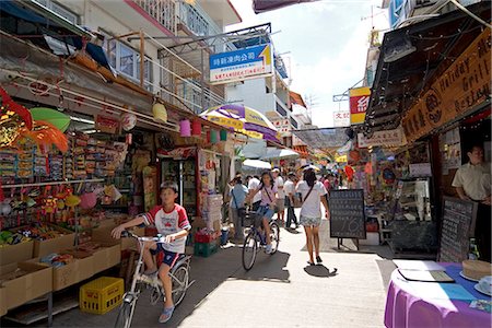 Leisure on Yung Shu Wan Main Street,Lamma Island,Hong Kong Stock Photo - Rights-Managed, Code: 855-03024113