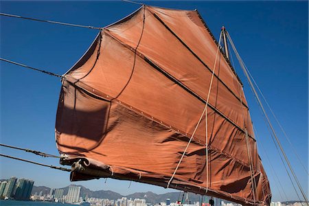 simsearch:855-03024093,k - Chinese junk Dukling in Victoria Harbour with Kowloon Bay  and Hung Hom skyline at background Foto de stock - Con derechos protegidos, Código: 855-03024344