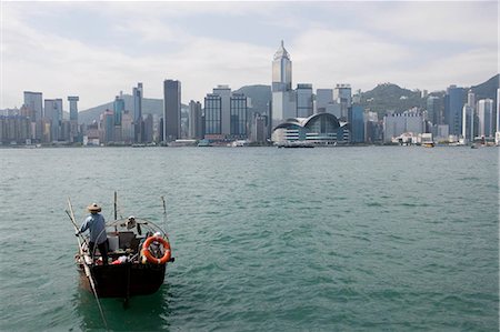 simsearch:855-03024462,k - Hong Kong skyline with a fishing boat in the harbour,Hong Kong Foto de stock - Con derechos protegidos, Código: 855-03024449