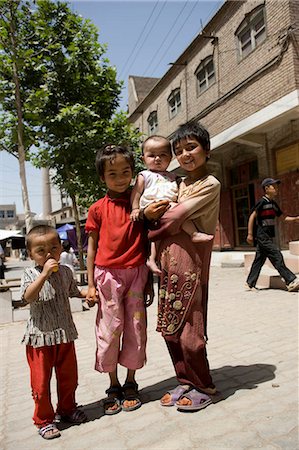 Uyghur kids,Old town of Kashgar,Xinjiang Uyghur autonomy district,Silkroad,China Stock Photo - Rights-Managed, Code: 855-03024557