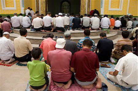 Uyghur people praying at Id Kar Mosque,Old town of Kashgar,Xinjiang Uyghur autonomy district,Silkroad,China Foto de stock - Con derechos protegidos, Código: 855-03024665