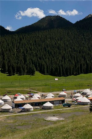 Kazakh yurts for tourist accommodation,Xi Baiyanggou,Nanshan ranch,Wulumuqi,Xinjiang Uyghur autonomy district,Silk Road,China Stock Photo - Rights-Managed, Code: 855-03024805