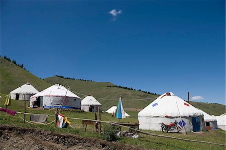 Kazakh yurts for tourist accommodation,Xi Baiyanggou,Nanshan ranch,Wulumuqi,Xinjiang Uyghur autonomy district,Silk Road,China Stock Photo - Rights-Managed, Code: 855-03024808