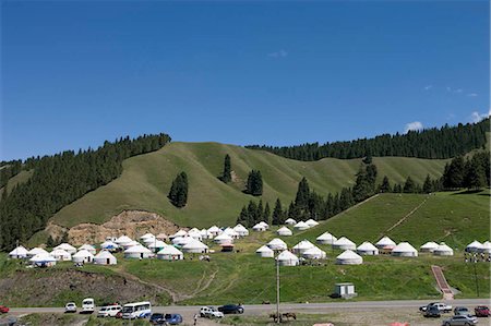 Kazakh yurts for tourist accommodation,Xi Baiyanggou,Nanshan ranch,Wulumuqi,Xinjiang Uyghur autonomy district,Silk Road,China Stock Photo - Rights-Managed, Code: 855-03024809