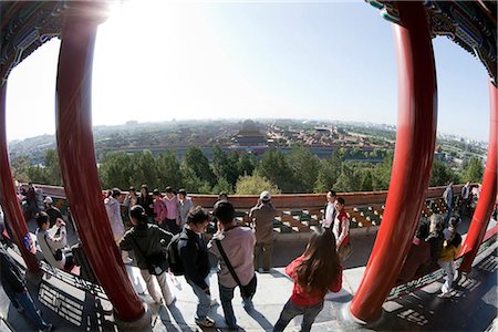 Tourists viewing the Forbidden City from Jingshan Park,Beijing,China Stock Photo - Rights-Managed, Code: 855-03025770