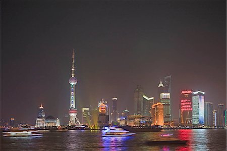 simsearch:855-03024224,k - Skyline of Pudong at night with tour boats on Huangpu River,Shanghai,China Foto de stock - Con derechos protegidos, Código: 855-03026184