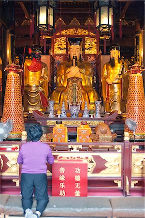 Worshipper praying in Temple of city god,Yu Yuan,Shanghai,China Stock Photo - Rights-Managed, Code: 855-03026217