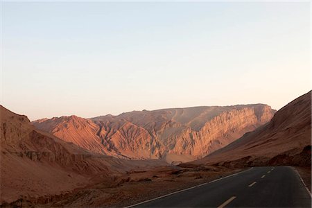 provincia di xinjiang - Flaming Mountain at dusk,Turpan,Xinjiang,China Fotografie stock - Rights-Managed, Codice: 855-03026416