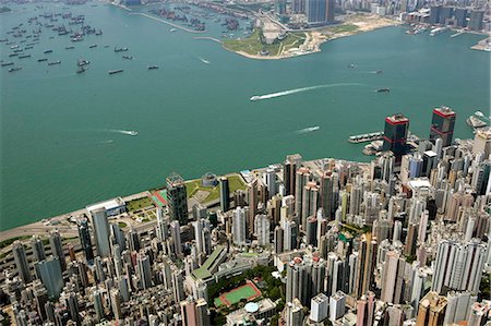 sheung wan - Aerial view overlooking Sheung Wan & Victoria Harbour,Hong Kong Foto de stock - Con derechos protegidos, Código: 855-03021795