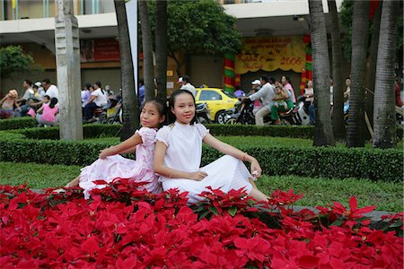 Girls pose for photo at the square,Ho Chi Minh City,Vietnam Stock Photo - Rights-Managed, Code: 855-03021939