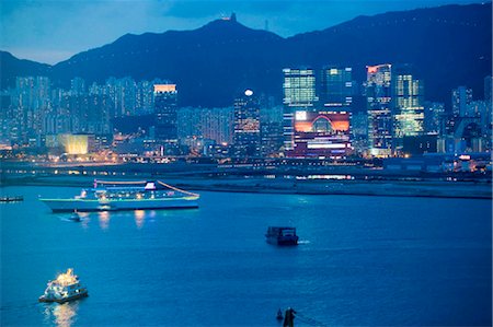 Skyline east Kowloon et le port de Victoria à la nuit tombante, Hong Kong Photographie de stock - Rights-Managed, Code: 855-03023048