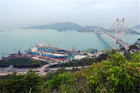 simsearch:855-06312643,k - Overlooking Tsing Ma Bridge and Ma Wan from Tsing Yi Island,Hong Kong Stock Photo - Rights-Managed, Code: 855-03023201