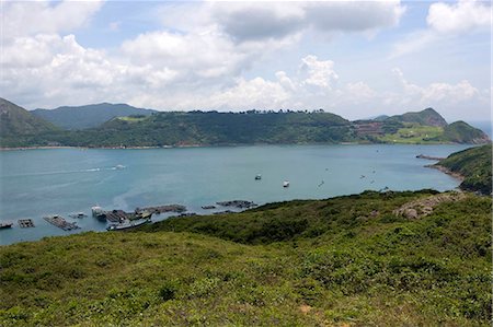 fazenda de peixes - Overlooking Clear Water Bay country club from Tung Lung Chau,Hong Kong Foto de stock - Direito Controlado, Número: 855-03023364