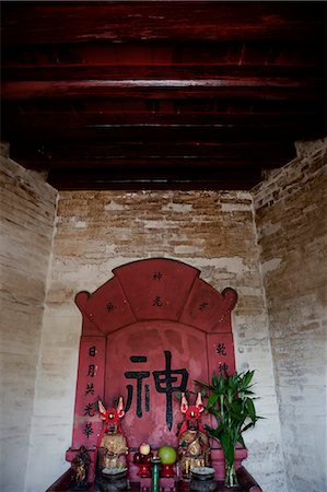 Altar housed in Tsui Sing Lau pagoda (pagoda of Gathering Stars),Ping Shan,New Territories,Hong Kong Stock Photo - Rights-Managed, Code: 855-03023973