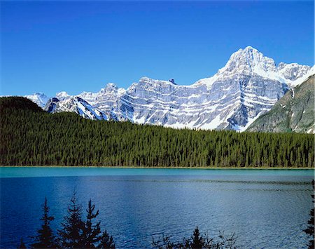 The Rockies and Waterfall Lake, Banff National Park, Canada Stock Photo - Rights-Managed, Code: 855-03254892