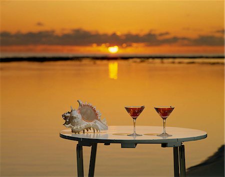 round table - Glasses of cocktail on a table at beach at dusk, Maldives Stock Photo - Rights-Managed, Code: 855-03255282