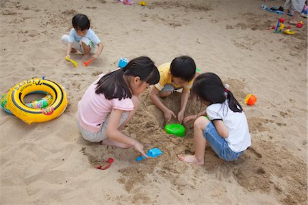 Kinder spielen im Park der Insel Strand, Ma Wan, Hong Kong Stockbilder - Lizenzpflichtiges, Bildnummer: 855-03252757