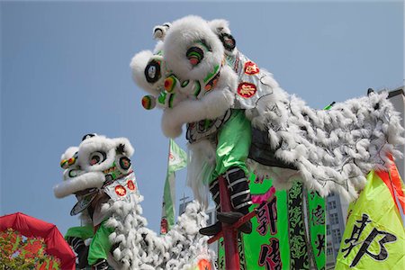Lion dance celebrating the Tam Kung festival, Shaukeiwan, Hong Kong Stock Photo - Rights-Managed, Code: 855-03252886
