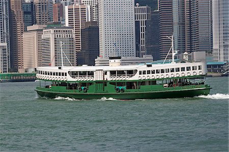 simsearch:855-03253445,k - Star ferry in Victoria Harbour with skyscrapers in the background, Hong Kong Stock Photo - Rights-Managed, Code: 855-03253445