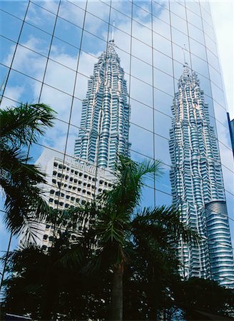 Reflection of Petronas towers on the curtain wall of commercial building, Kuala Lumpur, Malaysia Stock Photo - Rights-Managed, Code: 855-03253706