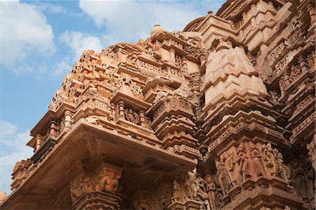 escultura a relieve - Carving details at a temple, Lakshmana Temple, Khajuraho, Chhatarpur District, Madhya Pradesh, India Photographie de stock - Rights-Managed, Code: 857-06721530