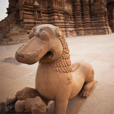 Close-up of a lions statue at a temple, Lakshmana Temple, Khajuraho, Chhatarpur District, Madhya Pradesh, India Photographie de stock - Rights-Managed, Code: 857-06721532