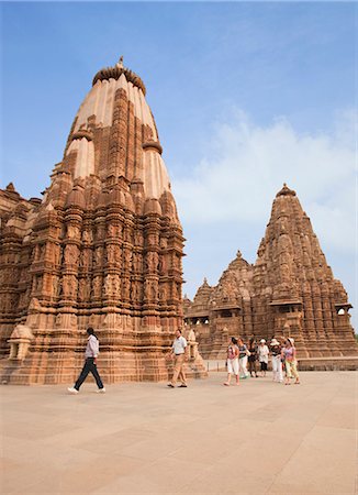 simsearch:841-06447826,k - Tourists admiring the architecture of a temple, Lakshmana Temple, Khajuraho, Chhatarpur District, Madhya Pradesh, India Foto de stock - Con derechos protegidos, Código: 857-06721533