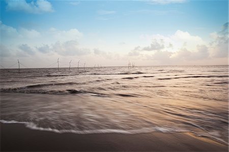 Hazira Beach at sunset, Surat, Gujarat, India Stock Photo - Rights-Managed, Code: 857-06721656