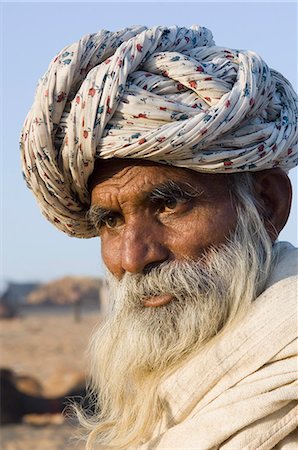 Close-up of a man wearing a turban, Pushkar, Rajasthan, India Foto de stock - Con derechos protegidos, Código: 857-03192473