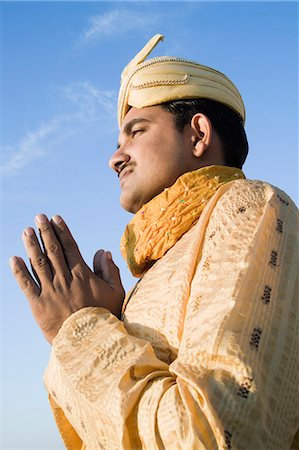 Side profile of a groom in prayer position, Jodhpur, Rajasthan, India Stock Photo - Rights-Managed, Code: 857-03192558