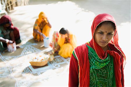 simsearch:655-03457904,k - Close-up of a mid adult woman thinking with rangoli in the background, Jodhpur, Rajasthan, India Stock Photo - Rights-Managed, Code: 857-03192604