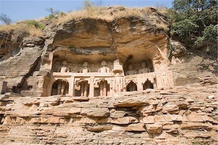 Jain sculptures carved in a wall, Gwalior, Madhya Pradesh, India Foto de stock - Direito Controlado, Número: 857-03192712