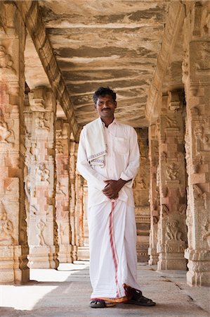 Homme debout dans un temple, Temple de Krishna, Hampi, Karnataka, Inde Photographie de stock - Rights-Managed, Code: 857-03192756