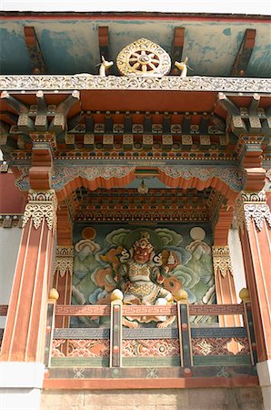 simsearch:857-03553660,k - Sculpture of a God on a wall, Bhutan Temple, Bodhgaya, Gaya, Bihar, India Fotografie stock - Rights-Managed, Codice: 857-03192984