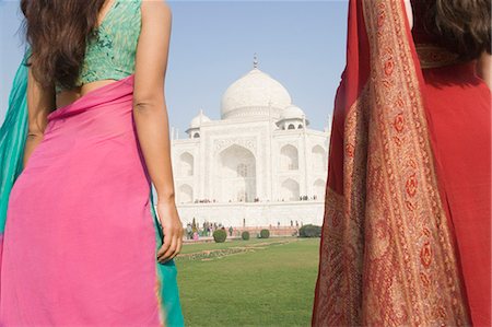 photos saris taj mahal - Two women standing in front of a mausoleum, Taj Mahal, Agra, Uttar Pradesh, India Stock Photo - Rights-Managed, Code: 857-03193050