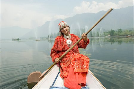 Portrait of a woman rowing a shikara, Dal Lake, Srinagar, Jammu And Kashmir, India Stock Photo - Rights-Managed, Code: 857-03193130