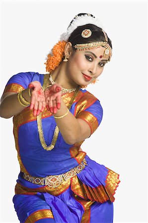 Woman performing Pushpaputam of Bharatnatyam Stock Photo - Rights-Managed, Code: 857-03554007