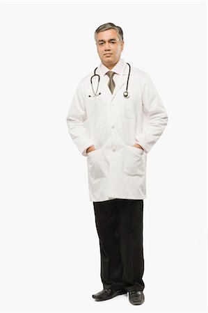doctor full body portrait - Portrait of a doctor standing Stock Photo - Rights-Managed, Code: 857-03554098