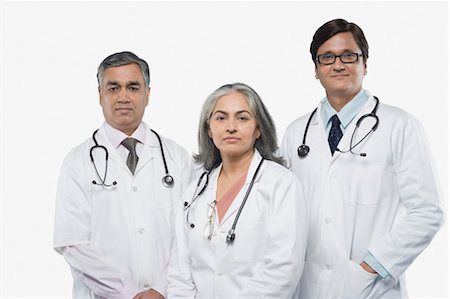 portrait medical white background not animal not smiling - Portrait of three doctors Stock Photo - Rights-Managed, Code: 857-03554126