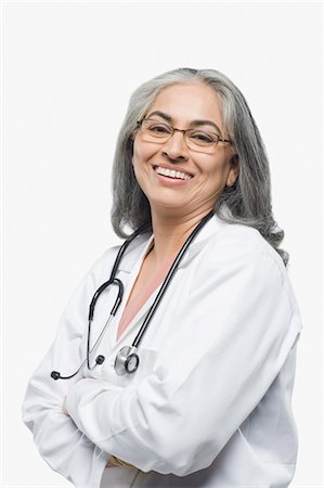 simsearch:857-03554275,k - Portrait of a female doctor smiling Fotografie stock - Rights-Managed, Codice: 857-03554122