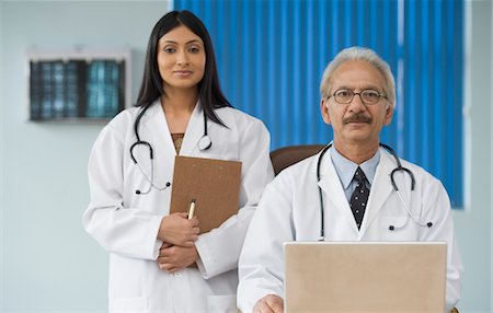 Two doctors in a hospital, Gurgaon, Haryana, India Stock Photo - Rights-Managed, Code: 857-03554236