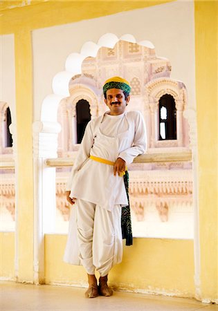 Man standing in a corridor, Meherangarh Fort, Jodhpur, Rajasthan, India Stock Photo - Rights-Managed, Code: 857-03553570