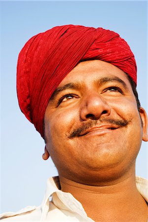 simsearch:841-03870336,k - Close-up of a young man smiling, Jaisalmer, Rajasthan, India Foto de stock - Con derechos protegidos, Código: 857-03553605